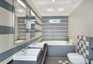 Modern bathroom in blue and gray tones with mosaic