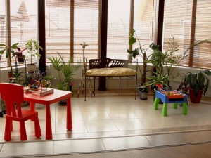 Nursery with toys and plants