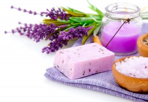 lavender soap, bath salt and candle isolated on white background