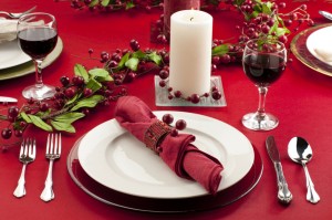 lighted candle on the dinner table