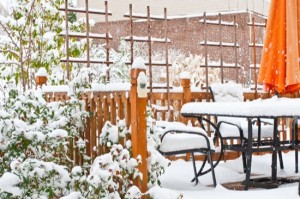 Snow on garden patio, winter scenery