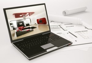 Laptop and blueprint of housing project 3d