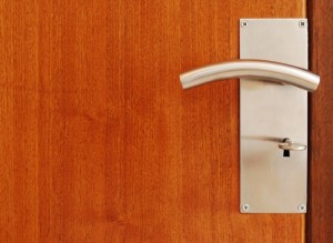 Metallic door handle with key